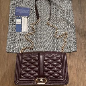 Rebecca Minkoff black cherry crossbody bag.